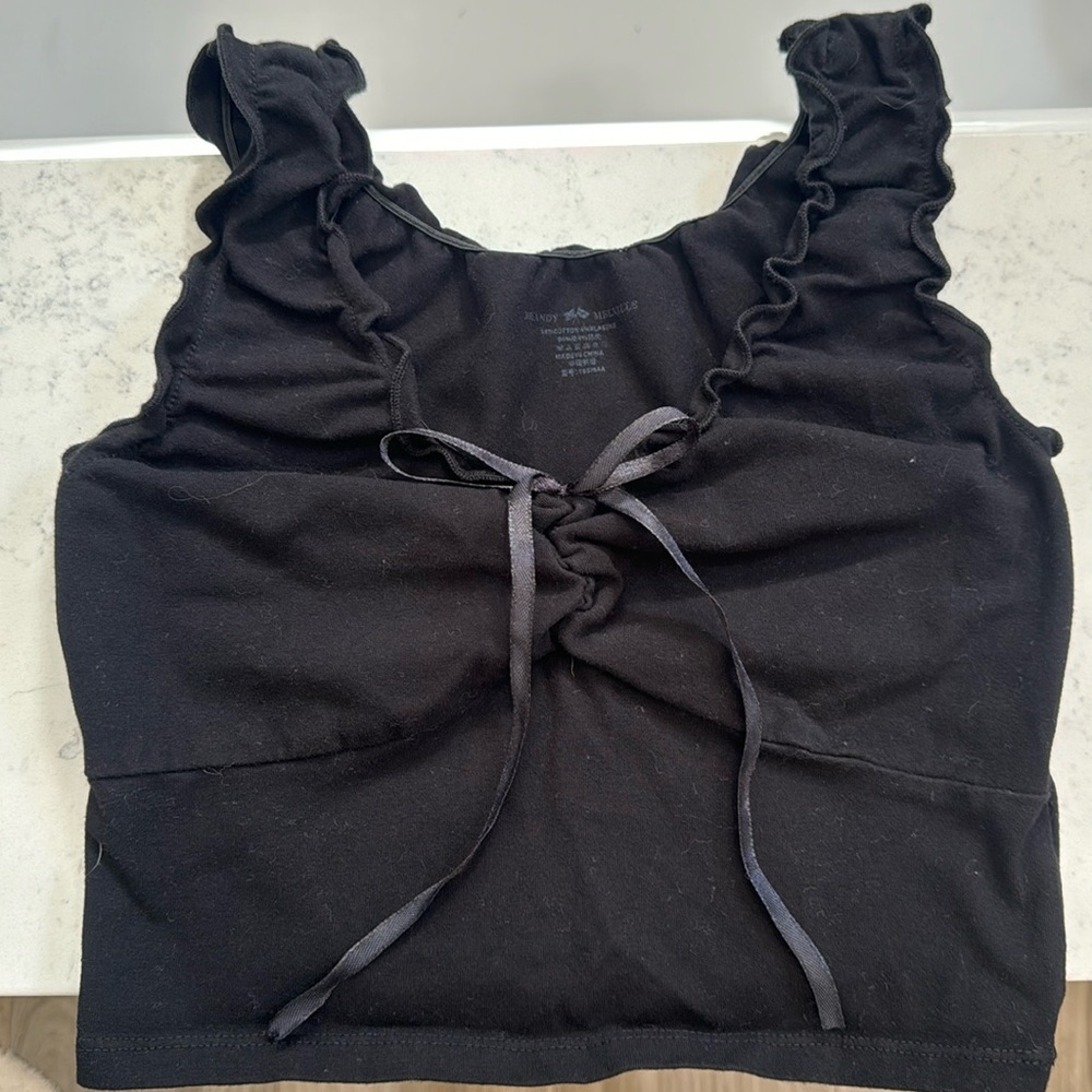 Black tank top with ruffle sleeves